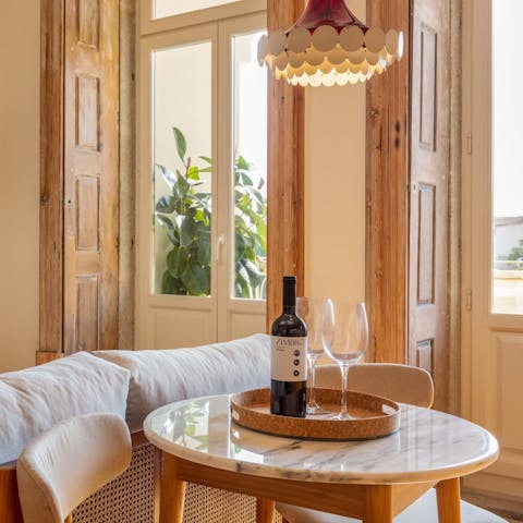Savour the sweetness of city living with a glass of local wine