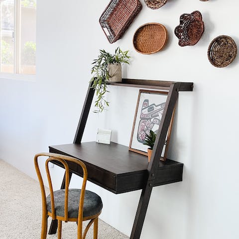 Hop on Zoom calls and check work emails at the boho-chic desk