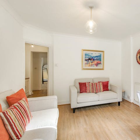 Unwind in the bright and welcoming living and dining space