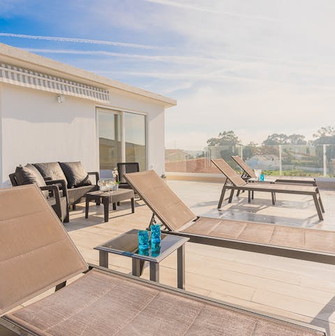 Watch the sunset from start to finish on the rooftop terrace