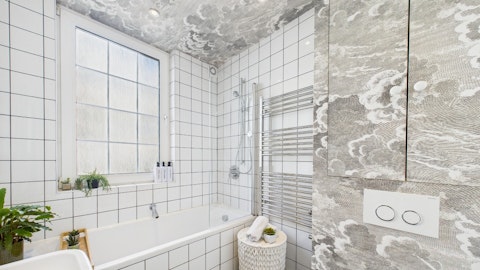 Unwind in the bath tub after a day walking in the city