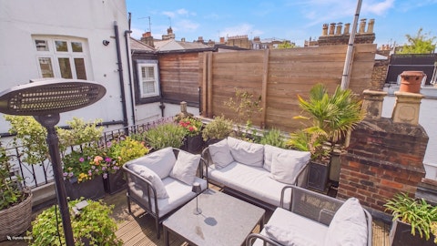Relax above the Notting Hill rooftops with a drink in hand