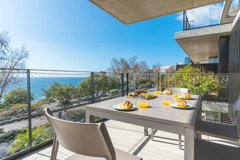 Take breakfast above the coastline as Funchal wakes up