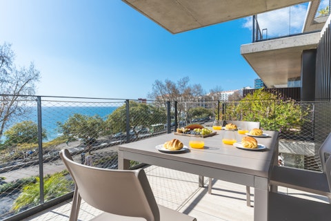 Take breakfast above the coastline as Funchal wakes up
