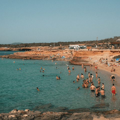 Drive ten minutes to Platges de Comte for a day at the beach