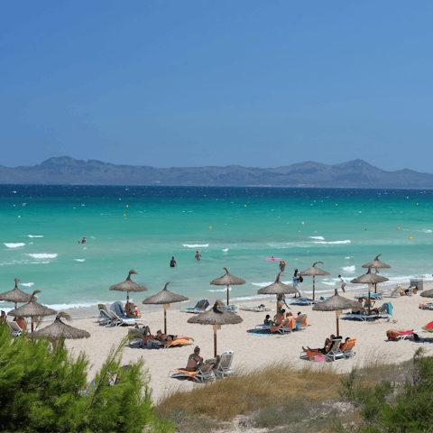 Spend sunny days at the sandy Playa de Muro, only minutes away by car