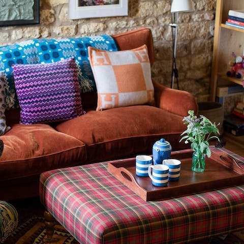 Kick back on the cushy sofa after a countryside walk and rest tired feet