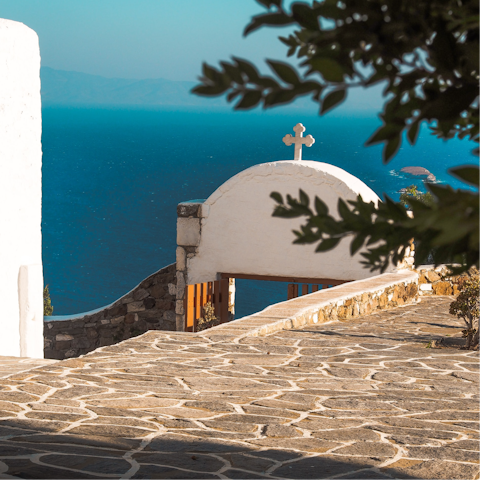 Explore Parikia's winding cobbled streets, a seven-minute drive away