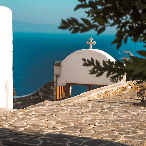 Explore Parikia's winding cobbled streets, a seven-minute drive away