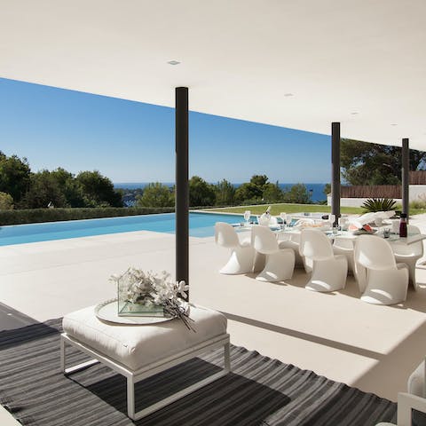 Dine alfresco in the sleek chill-out area