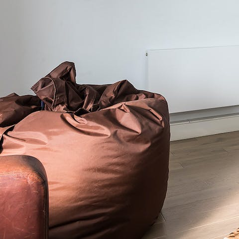 Plop down on the cushy bean bag with a good book