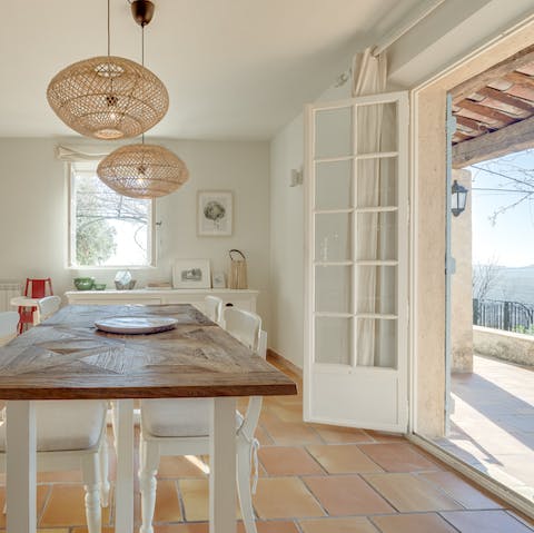 Cook up a storm and enjoy the meal in a light-filled dining area