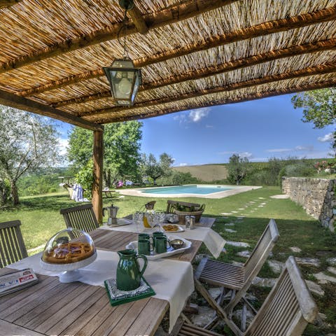 Enjoy an alfresco breakfast under the shade of the pergola