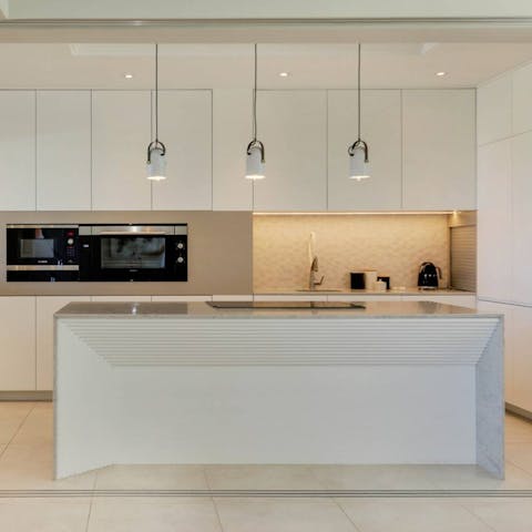 Put on your chef's apron and cook up a storm in the sleek kitchen