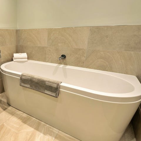 Indulge at the day's end in a long, hot soak in the bath tub
