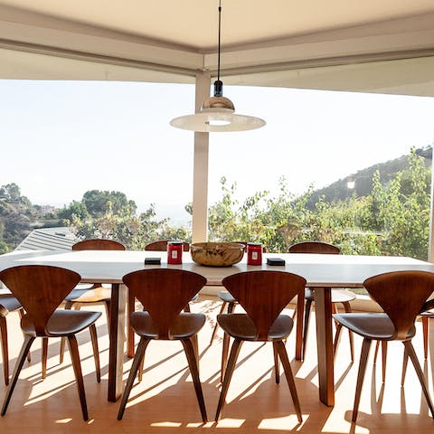 Watch a sunset blaze over the hills as you tuck into your dinner