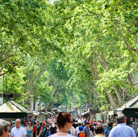 Mingle with locals and tourists and enjoy the buzz on Las Ramblas – a ten–minute walk away