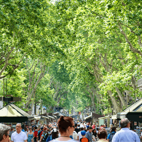 Mingle with locals and tourists and enjoy the buzz on Las Ramblas – a ten–minute walk away