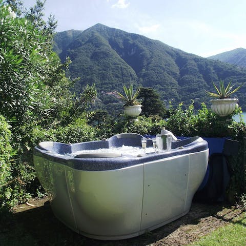 Pour yourself a glass of fizz and unwind in the hot tub