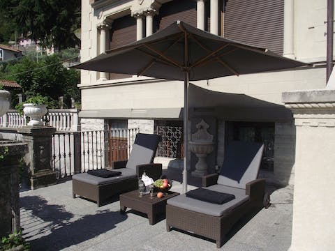 While away the hours on a lounger with a good book in hand