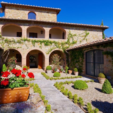 Stroll in the home's pretty courtyard