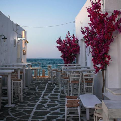Explore the idyllic seaside town of Paros, Naousa is just a five-minute drive away