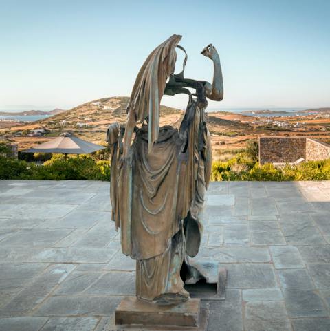 Admire the ancient Greek myth inspired sculptures in the garden