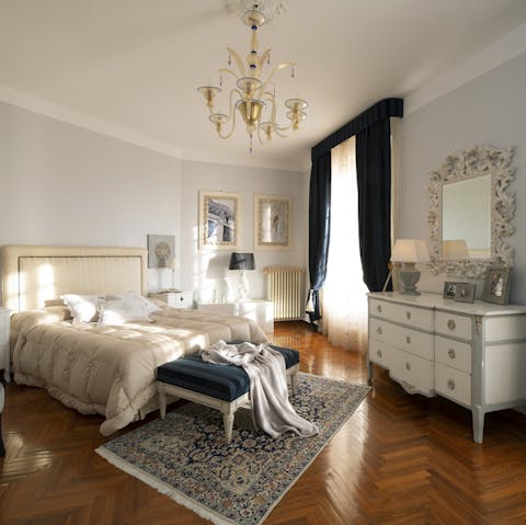 Wake up in a decadent bedroom filled with antiques