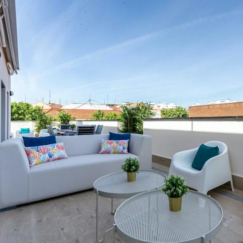 Prepare a pitcher of sangria and unwind on the rooftop terrace