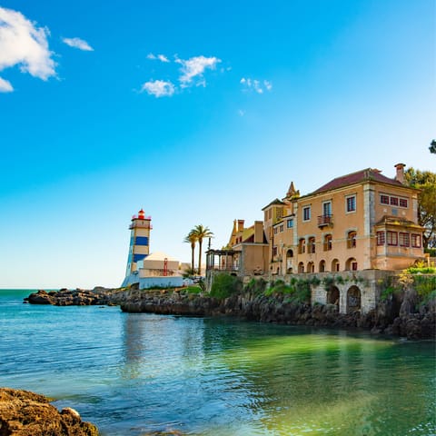 Explore the gorgeous coastline of Cascais, lined with historic buildings