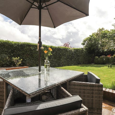 Enjoy a glass of wine in the sunny garden