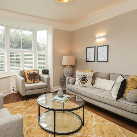 Curl up with a good book in the cosy sitting room