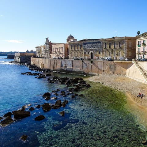Walk to the waterfront to take in the view and paddle along the shore