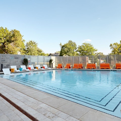 Bask in the Texan sun by the shared pool