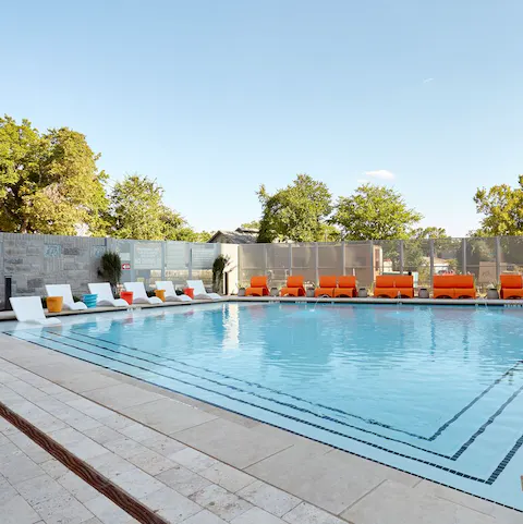 Bask in the Texan sun by the shared pool