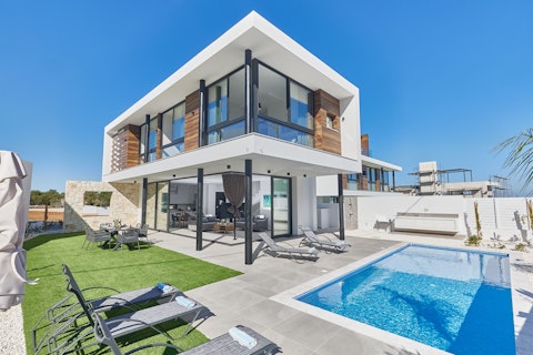 Cool off in the pool beneath open blue skies