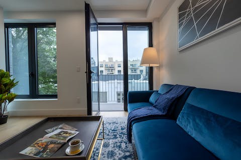 Open the doors up to the private balcony and enjoy the fresh air