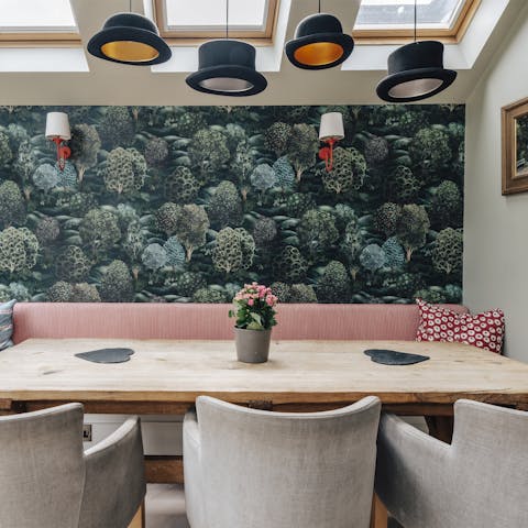 Savour breakfast at the dining table with its bowler hat lights
