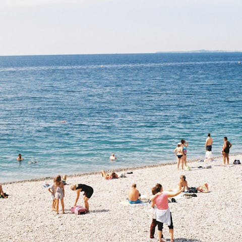 Cool off in the sea at Plage de Carnolès, twelve-minute walk away