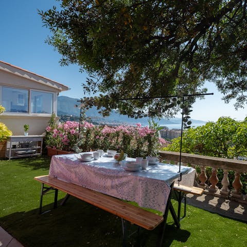 Admire the sea views from the garden as you dine alfresco