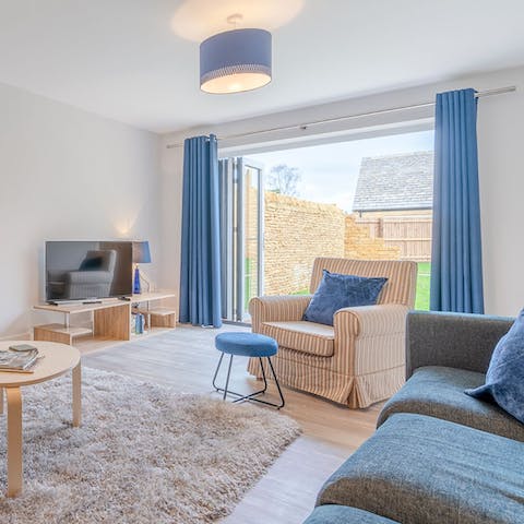 Open up the bi-fold doors and let the countryside air circulate inside