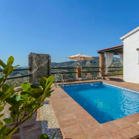 Spend idyllic days gazing at the views whilst swimming in the pool