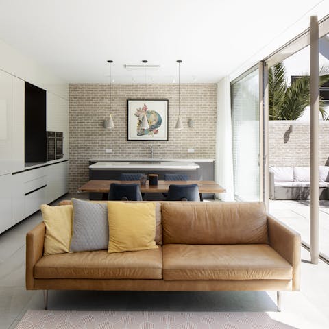 Rest in the lounge with your morning coffee, or tuck into meals around the stylish dining set