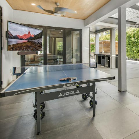 Challenge your guests to a game of alfresco table tennis