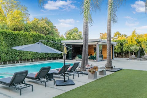 Enjoy a lazy afternoon reading by the pool