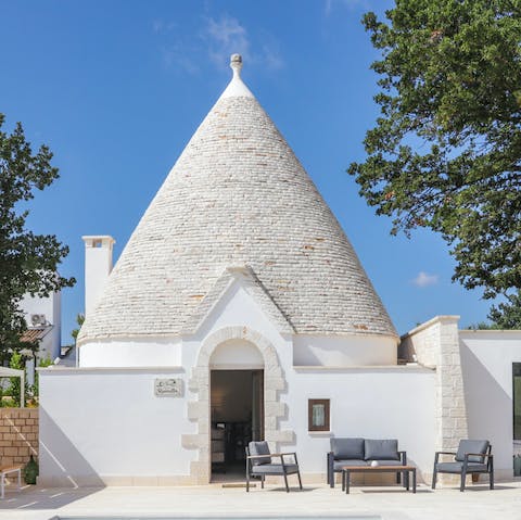 Admire the unique architecture from the poolside sun loungers