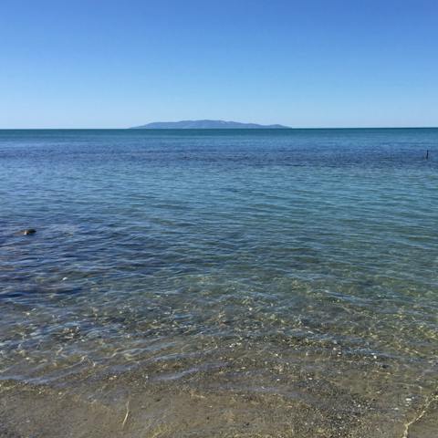 Wade out into the crystal-clear Tyrrhenian