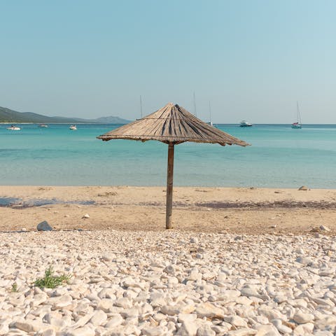 Look forward to spending long, hot afternoons on Kamini Beach, just 400-metres from your doorstep