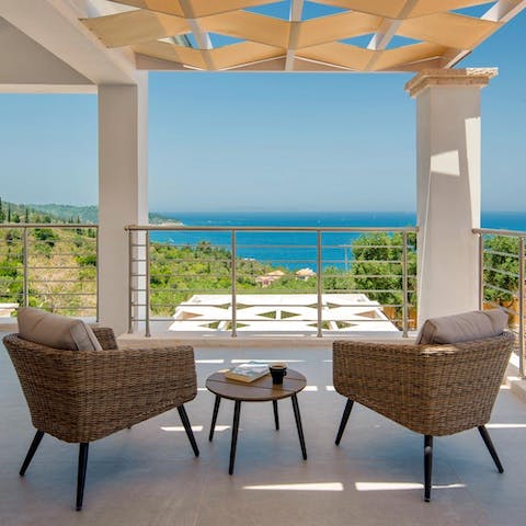 Wake up with a coffee and gaze across the glittering seascape