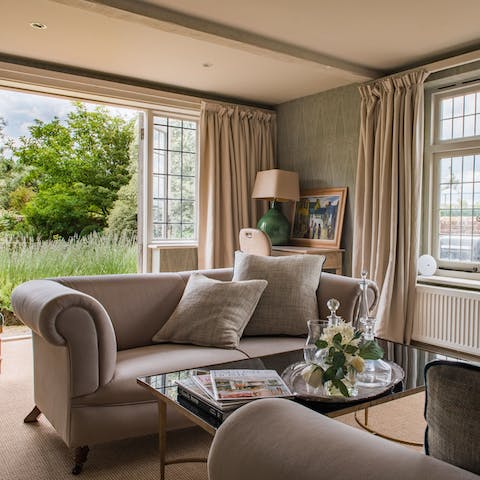 Curl up around the fire and drink in the countryside views